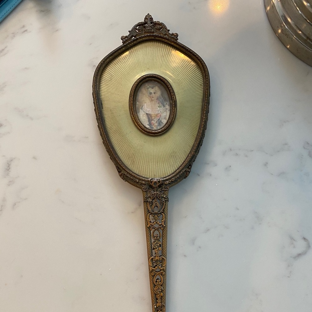 Antique hand mirror